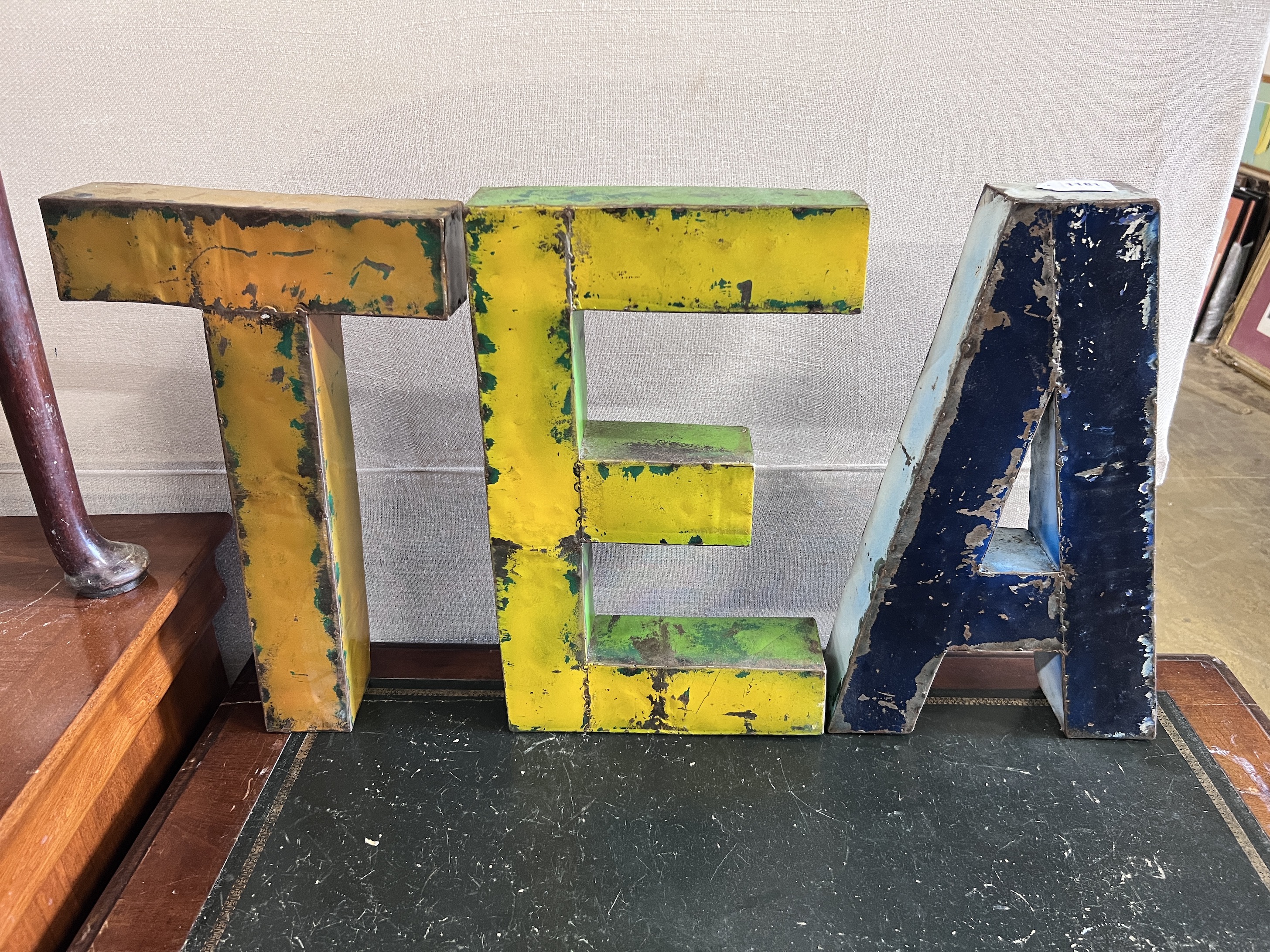 Three painted iron letters spelling TEA, height 50cm